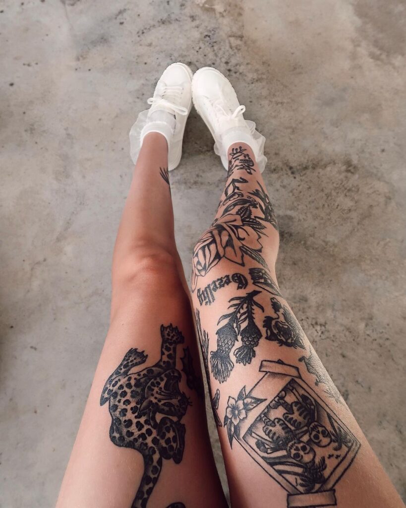 patchwork tattoo on legs