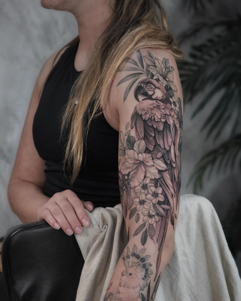 full sleeve tattoo with flower elements